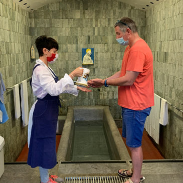 Make the “water gesture” at the Baths